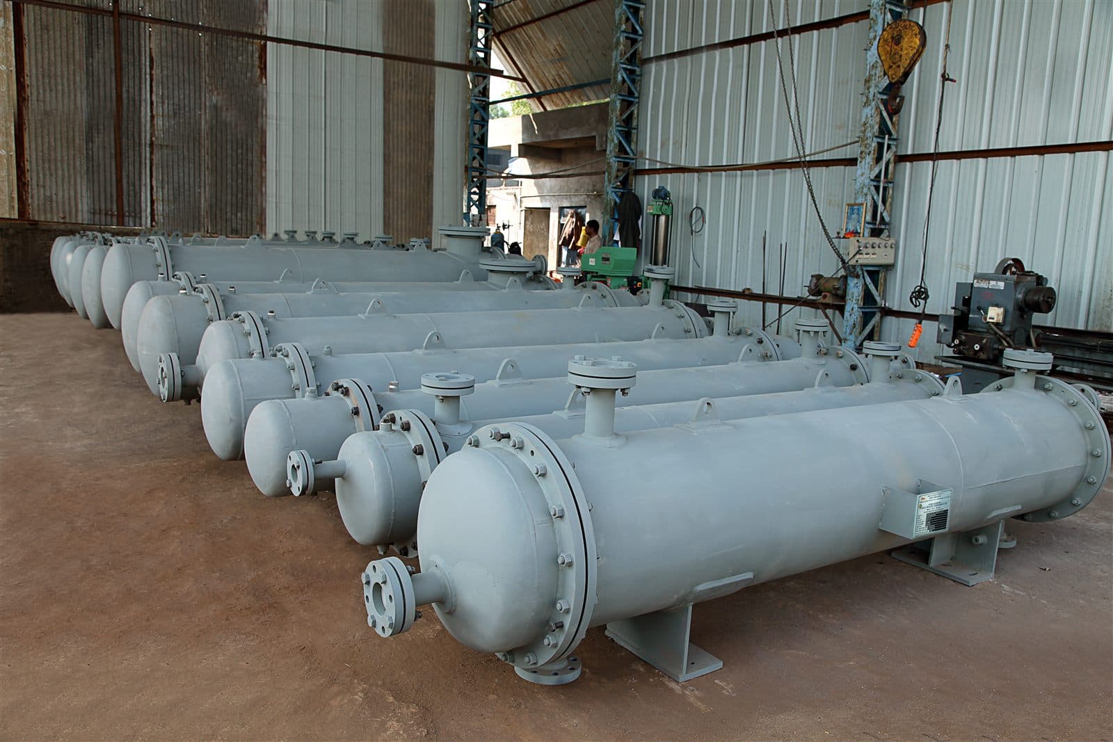 Multiple shell and tube heat exchangers in manufacturing bay